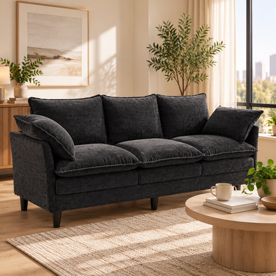 Charcoal chenille 3-seat sofa in a bright living room with a round coffee table