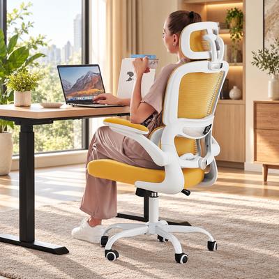 Yellow compact mesh ergonomic chair with white frame, headrest and flip-up arms