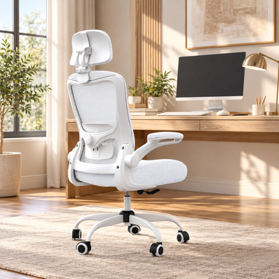 White high-back mesh ergonomic office chair with headrest and flip-up arm in a home office