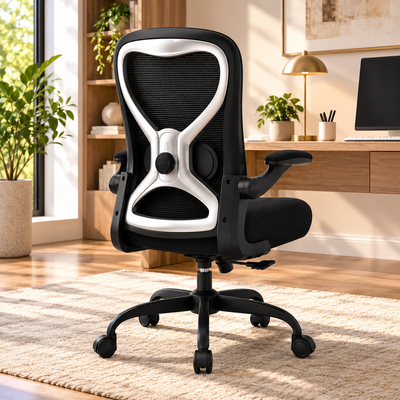 Black mesh ergonomic office chair with silver trim, hourglass back and flip-up arms in a home office