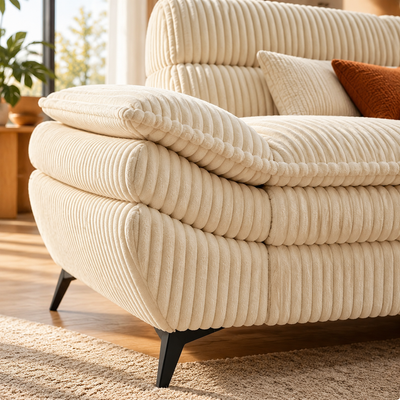 Close-up of the plush corduroy arm, cushions and angled black leg