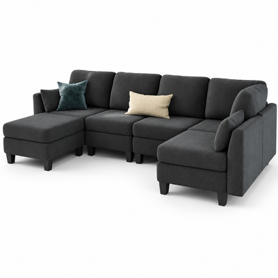 Dark grey modular U-shaped sectional sleeper sofa with ottoman and throw pillows