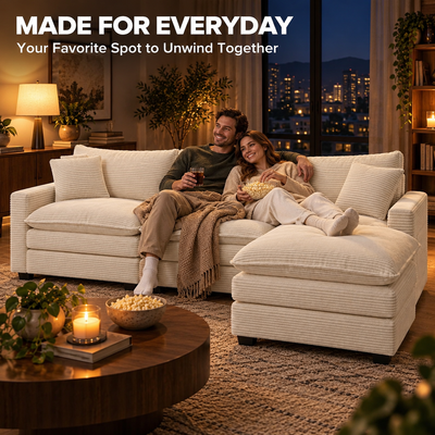 Couple relaxing on the cream sectional for movie night