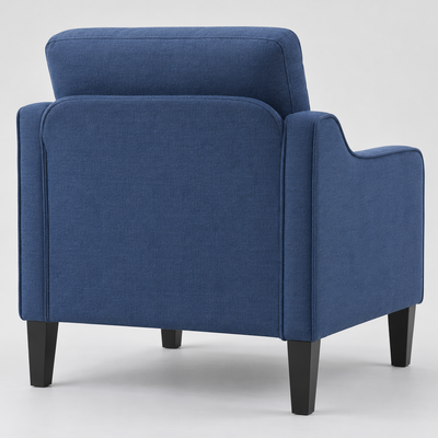 Rear three-quarter view of the navy accent chair showing the back and tapered legs